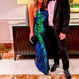 Green metallic one shoulder gown